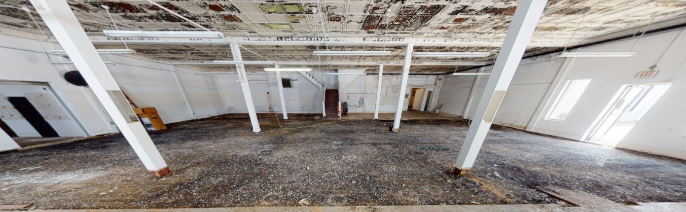 3D scan of the Building 2 ground floor as it is today: open floor with a column grid
